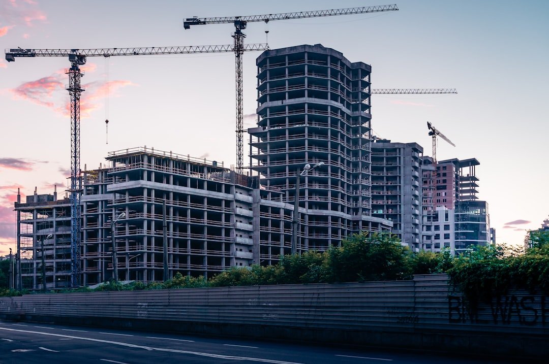 Services white-concrete-building-near-road-during-daytime-piquc3a97v0